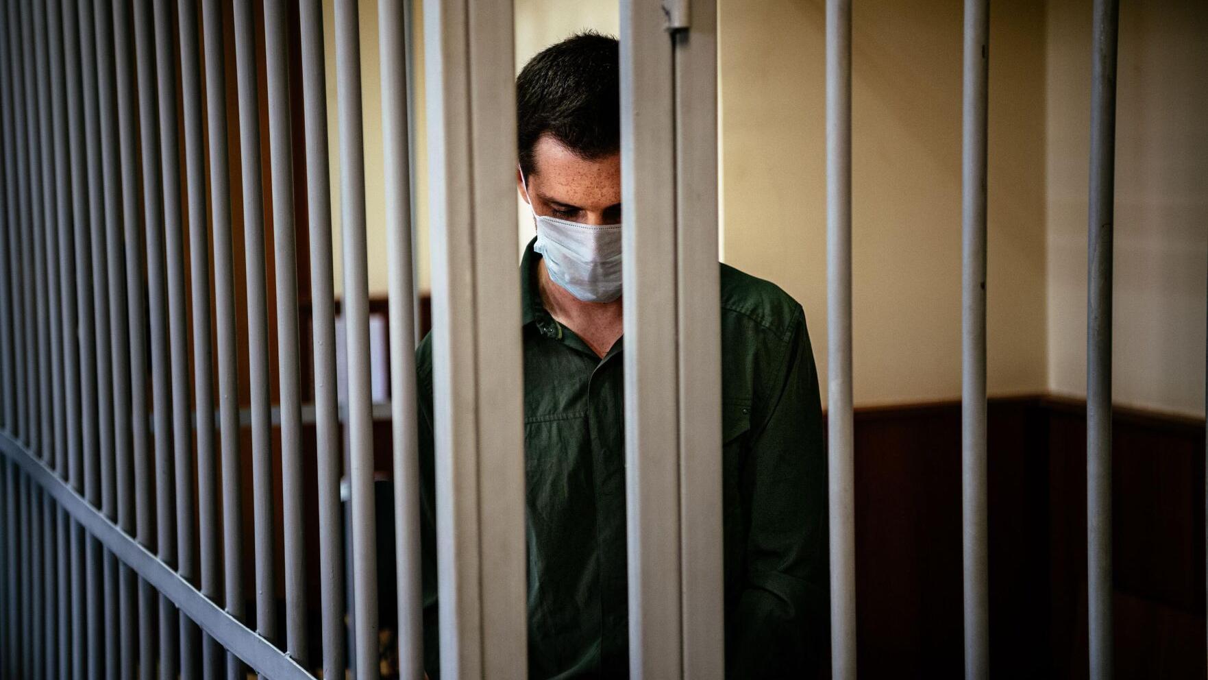 American detained in Russia says he is coughing up blood, has not received medical care